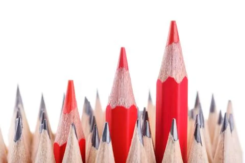 Three sharpened red pencil among many ones Stock Photos