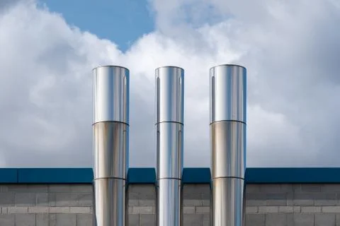 Three Shiny Chimneys Stock Photos