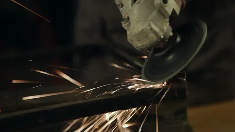 Three shots of a man grinding in his workshop. Close up. High definition video. Stock Footage 88354644