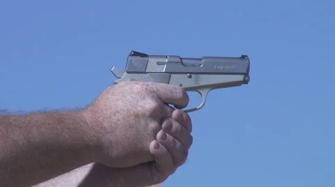 Three shots then empty magazine Stock Footage 954084