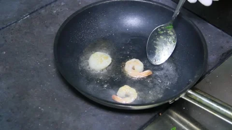 Three shrimps on the frying pan 스톡 동영상 48396160