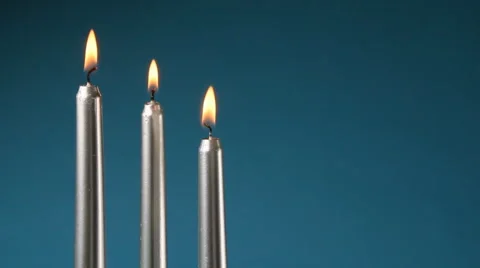 Three silver candles Stock Footage 885119