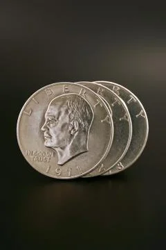 Three Silver Dollars Stock Photos