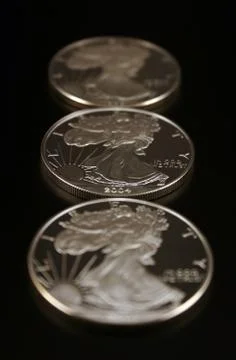 Three Silver Dollars Stock Photos