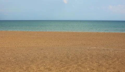 Three simple elements sky water and sand on summer Stock Photos