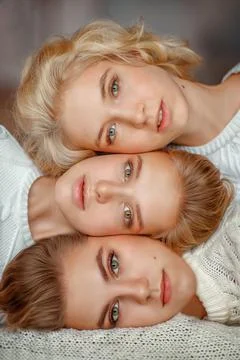Three sisters - face to face Stock Photos