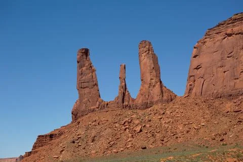 The three sisters in monument valley Stock Photos