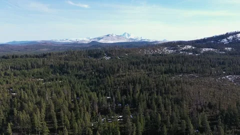 Three Sisters mountains captured from Highway 20 Oregon drone video Stock Footage 285515175