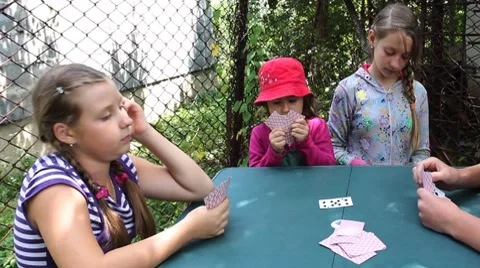 Three Sisters Play Cards Stock Footage 8659374