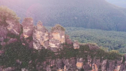 Three Sisters rock formation in Blue mountains of Australia as aerial 4k. Stock Footage 248648053