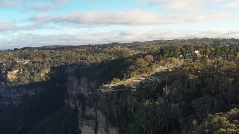 Three sisters rock formation peaks in Katoomba town, Australia 4k aerial. Stock Footage 156687121
