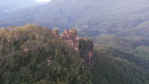 Three sisters rock formation sandstone peaks in Blue Mountains aerial 4k. Stock Footage 244979222