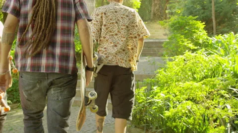 Three skateboarders climbing the steps Stock Footage 61274546
