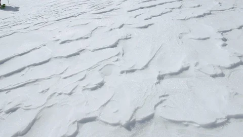 Three skilled skiers walking with ski pole on snowy surface Stock Footage 116787891