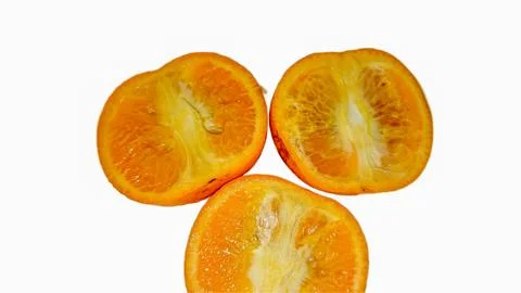 Three Sliced Orange Halves Close-Up. Stock Photos