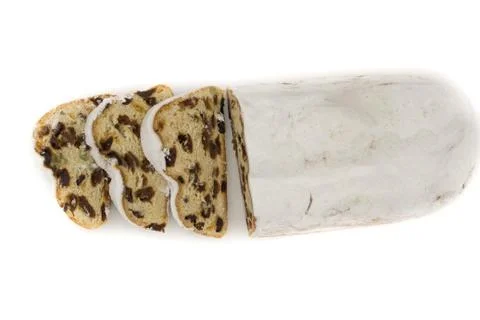 The three slices and the main part of Stollen isolated on a white background. Stock Photos