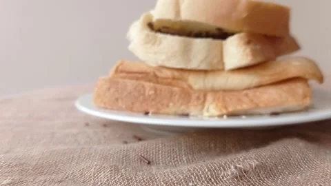 Three slices of bread with chocolate sprinkles Stock Footage 146256565