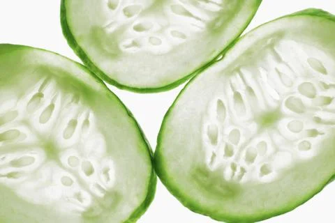 Three slices of cucumber Stock Photos