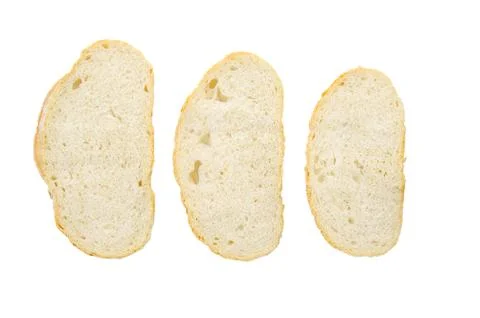 Three slices of wheat bread. White isolate. Stock Photos