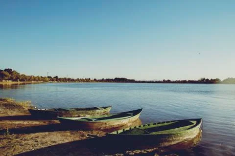 Three small boats Stock Photos