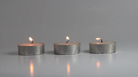 Three small candle Stock Footage 95825629
