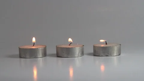 Three small candle Stock Footage 95825630