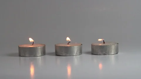 Three small candle Stock Footage 95825742