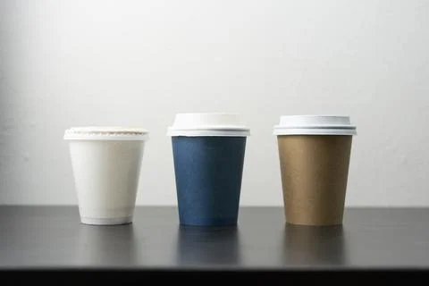 Three small cups for take away drinks Stock Photos