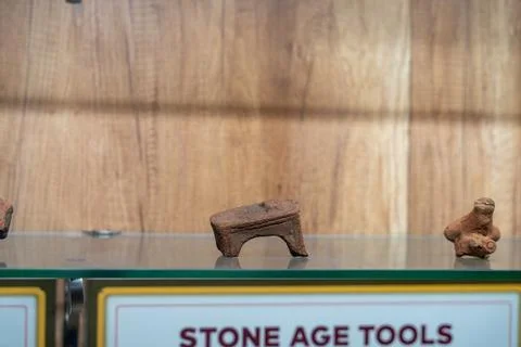 Three small objects on a glass shelf. in Chennai Stock-Fotos