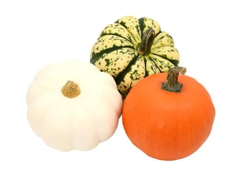 Three small pumpkins - orange, white and green striped gourds Stock Photos