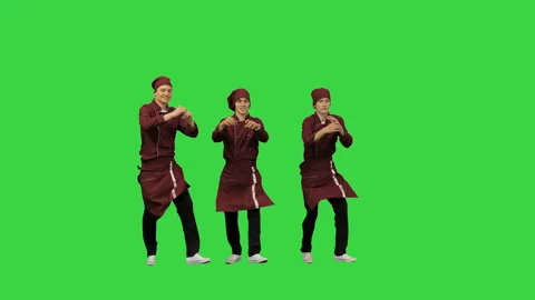 Three smiling chef cooks in red uniform synch dancing against green background Stock-Footage 139113250