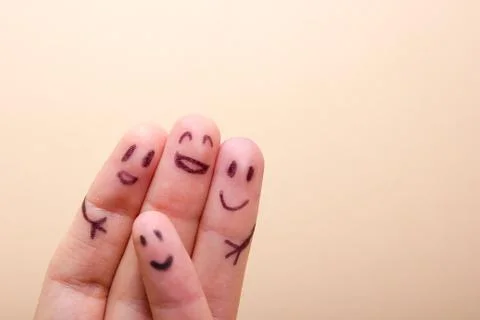 Three smiling fingers that are very happy to be friends Stock-Fotos