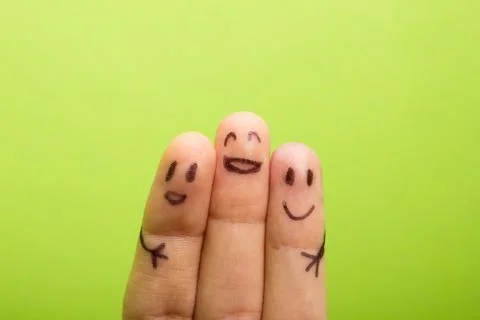Three smiling fingers that are very happy to be friends Stock Photos