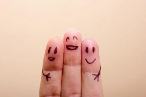 Three smiling fingers that are very happy to be friends Stock Photos