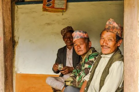 Three smiling men in Nepal Stock Photos