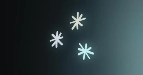 Three snowflake like object on black background Stock Footage 314854155