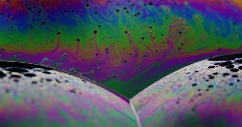 Three soap bubble intersection showing s... | Stock Video | Pond5