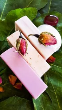Three soaps of different fragrances for spa treatments Stock Photos