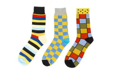 Three sock with different lines isolated on white background. Colorful sock s Stock-Fotos