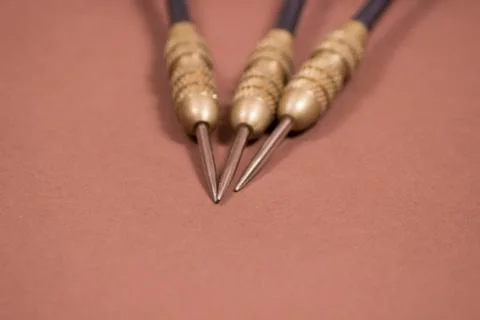 Three spiked black darts Stock Photos