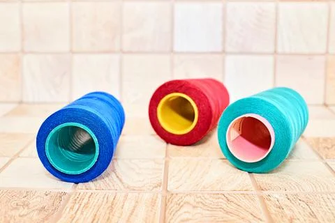 Three spools of thread. Navy, red and blue Stock Photos