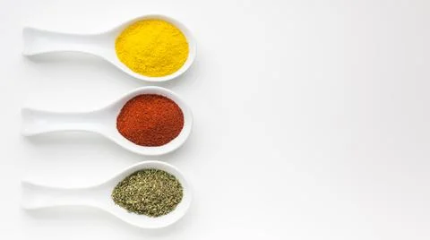 Three spoons with spicy powder table. High quality and resolution beautiful Stock Photos
