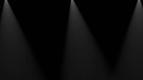 Three spotlights shine in different directions on a black background. Seamless Stock Footage 137788205