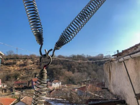 Three springs intersect at a single point Stock Photos