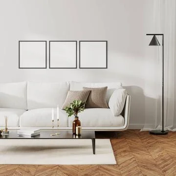 Three square frames mock up in home living room interior with white sofa a... Foto stock
