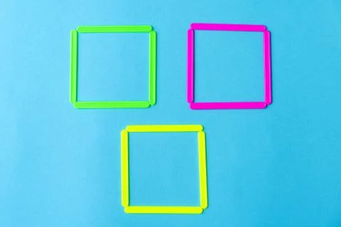 Three squares of counting plastic sticks designed for teaching counting to young Stock Photos