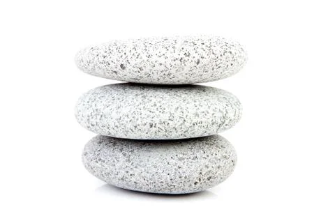 Three stacked stones Stock Photos