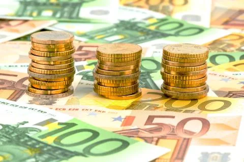 Three stacks of coins Stock Photos