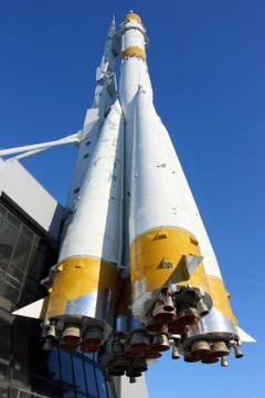 Three-stage space rocket against a blue sky Stock Photos