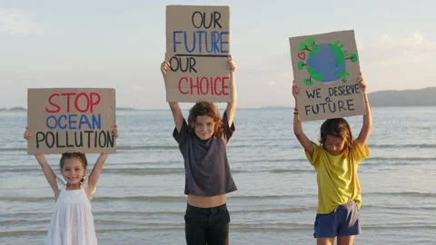 Three staying on the seaside at sunset light against the backdrop of the island Stock Footage 191459054